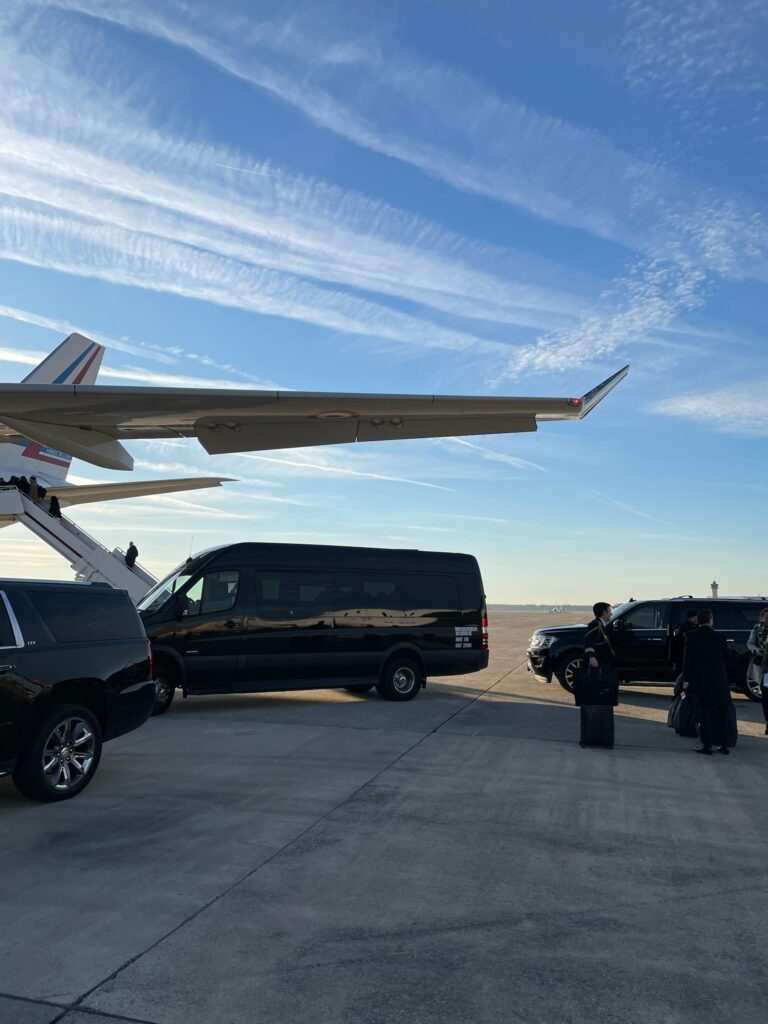 SUVs planeside for a private-aviation arrival