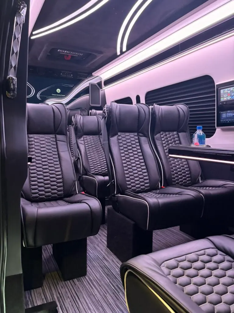Leather captain's chairs inside an executive Mercedes Sprinter